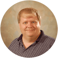 Friendly person in patterned shirt supporting VoIP Country's solutions for managed service providers.
